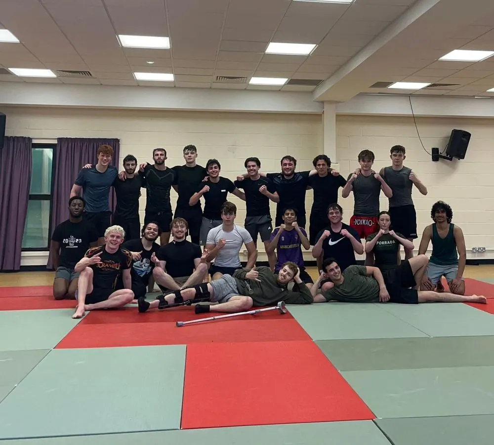 The society together in the training hall