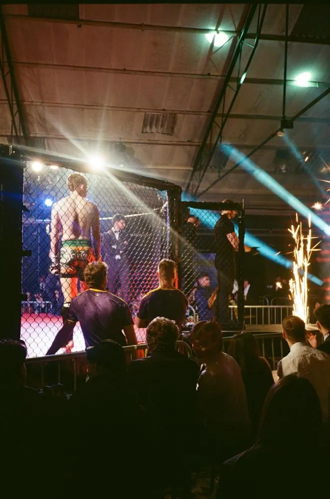 The cage and the crowd on fight night